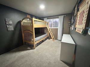 Bedroom featuring carpet
