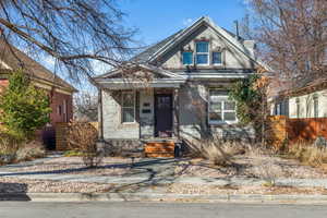 Darling home with newer water-wise landscaping and new front steps.