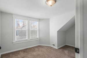 Upstairs bedroom with lots of natural light.