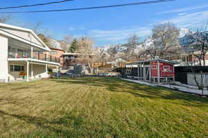 View of yard with an outbuilding and exterior structure