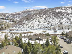 Snowy aerial view with a mountain view