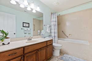 Main bath with skylight and jetted tub