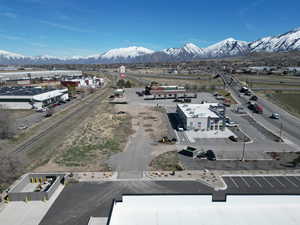 Birds eye view of property with a mountain view