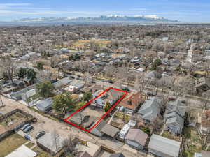 Aerial view featuring a mountain view and a residential view