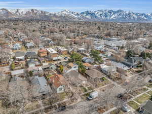 Birds eye view of property featuring a mountain view and a residential view