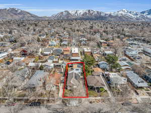 Birds eye view of property featuring a mountain view and a residential view