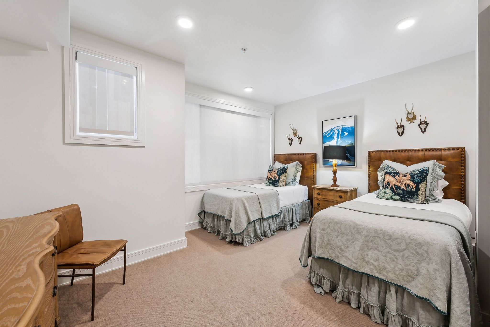 Carpeted bedroom with recessed lighting and baseboards