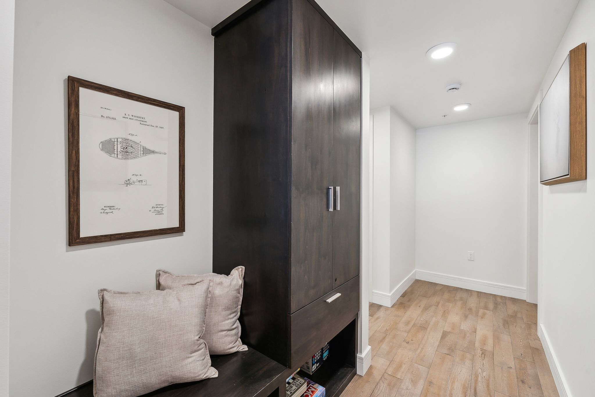 Hallway featuring recessed lighting, baseboards, and light wood-style floors