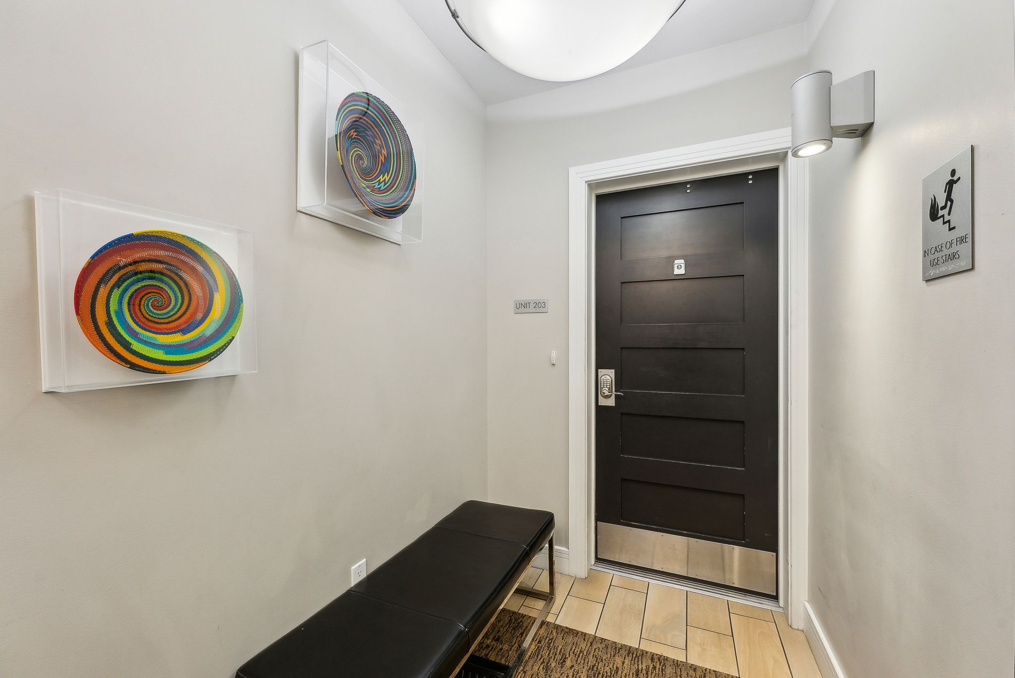 Interior space with baseboards and wood finish floors