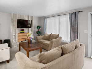 Living room with light colored carpet
