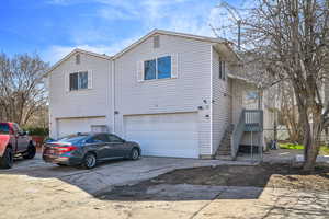 Exterior space with a garage and driveway