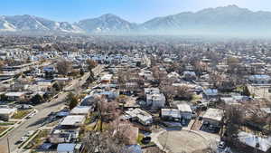 Birds eye view of property with a mountain view