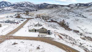 Snowy aerial view with a mountain view