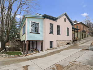 View of side of property featuring a patio