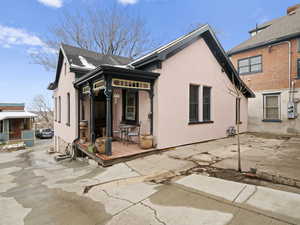 Front of house with porch and Victorian detailing