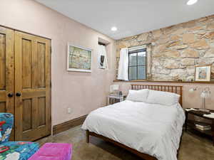 Bedroom featuring recessed lighting and baseboards