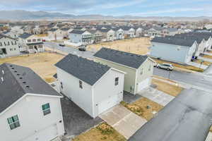 Drone / aerial view with a mountain view and a residential view