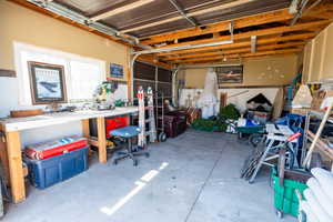 Garage featuring a workshop area