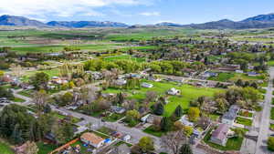 Drone / aerial view featuring a residential view and a mountain view