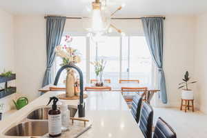 Details with light countertops and a sink
