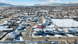 Aerial view featuring a mountain view and a residential view