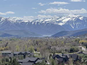 Mountain view featuring nearby suburban area