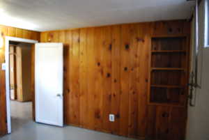 Interior space featuring wooden walls