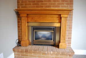 Room details featuring a glass covered fireplace