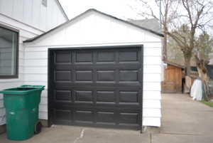 Garage with concrete driveway