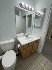 Bathroom featuring toilet and vanity