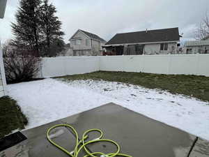 View of yard with fence