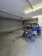 Garage featuring a garage door opener