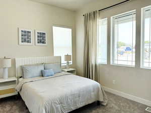 Bedroom 2 carpeted bedroom featuring baseboards