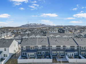 Aerial view featuring a residential view and a mountain view