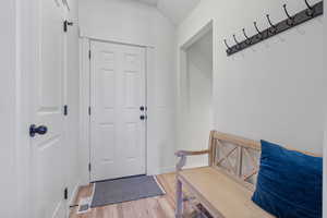 Garage entry and basement stairway