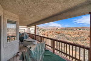 Balcony with a grill and a mountain view