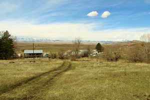 View of mountain feature with a rural view