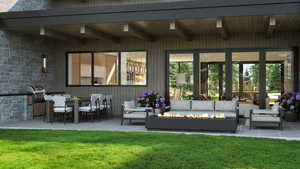 View of patio / terrace with an outdoor living space with a fire pit and area for grilling