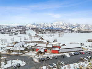 Snowy aerial view with a mountain view