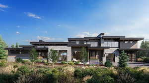 View of front of house featuring a garage, stone siding, and driveway