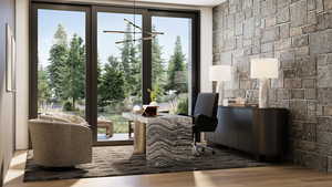 Interior space featuring an inviting chandelier and wood finished floors