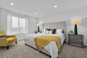 Bedroom featuring carpet flooring, recessed lighting, visible vents, and baseboards