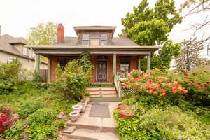 Victorian home with traditional large covered porch