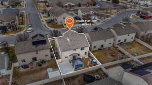 Birds eye view of property with a residential view