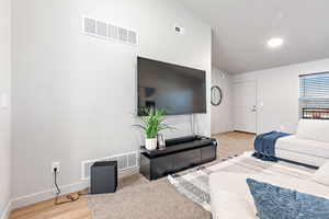 Bedroom with visible vents and baseboards