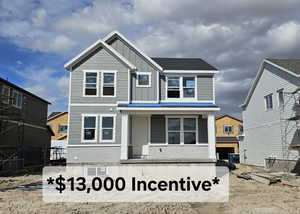 View of front of property featuring board and batten siding