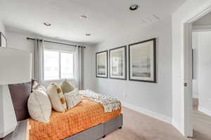 Bedroom with recessed lighting, visible vents, baseboards, and carpet flooring