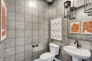 Bathroom with toilet and a sink