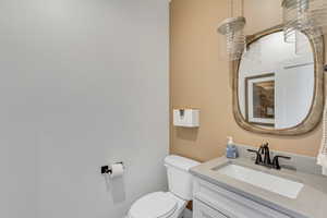 Bathroom with vanity and toilet