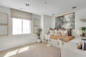 Bedroom with recessed lighting, visible vents, carpet floors, and baseboards